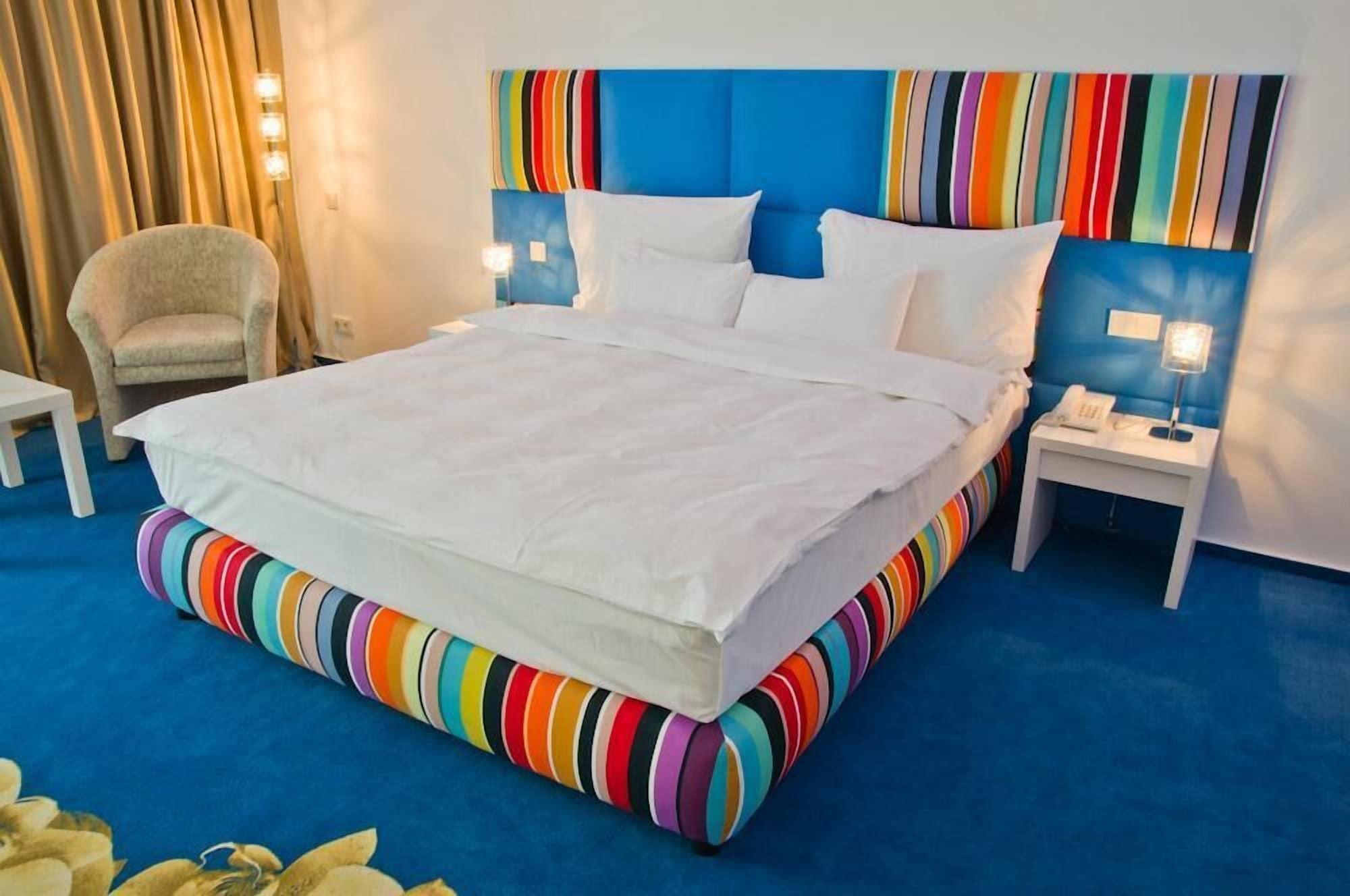 فندق مارشال غاردن بوخارست الغرفة الصورة A bed
